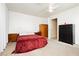 Bedroom with carpet floors, ceiling fan and basic bedroom furniture at 408 N Torrey Pines Dr, Las Vegas, NV 89107