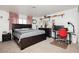 Bedroom with a large bed, red curtains, and desk for work or study at 408 N Torrey Pines Dr, Las Vegas, NV 89107