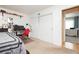 Bedroom featuring closet and doorway to additional room at 408 N Torrey Pines Dr, Las Vegas, NV 89107