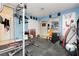 Well-equipped home gym featuring weight machines, weight bench, and rubber flooring at 408 N Torrey Pines Dr, Las Vegas, NV 89107