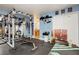 Home gym boasts weight machines, pull up bar, weight racks and accessories at 408 N Torrey Pines Dr, Las Vegas, NV 89107