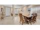 Dining room with open floor plan, neutral tones, and access to other living areas at 10135 Haymarket Peak Ave, Las Vegas, NV 89166