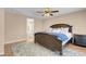 A spacious main bedroom with a walk in closet, and light colored walls at 10135 Haymarket Peak Ave, Las Vegas, NV 89166