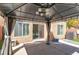 Covered back patio featuring concrete flooring and stylish curtains at 10241 Headrick Dr, Las Vegas, NV 89166