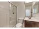 The bathroom features a glass enclosed shower, toilet and vanity with a sink at 10241 Headrick Dr, Las Vegas, NV 89166