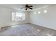 Bright bedroom with large window and plantation shutters offers lots of light at 10241 Headrick Dr, Las Vegas, NV 89166