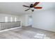 The loft offers a railing, great lighting, and an open layout for versatility at 10241 Headrick Dr, Las Vegas, NV 89166