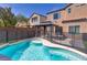 Enjoy this refreshing pool featuring a safety fence and a gazebo, perfect for outdoor relaxation at 10241 Headrick Dr, Las Vegas, NV 89166