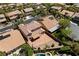 Aerial view of a home's backyard with patio, pool, and well-maintained lawn at 10281 Wolves Den Ln, Las Vegas, NV 89178