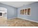 Open-concept dining space features a large window and kitchen access at 10281 Wolves Den Ln, Las Vegas, NV 89178