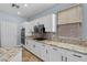 Well-equipped kitchen features stainless steel appliances and beautiful granite countertops at 10281 Wolves Den Ln, Las Vegas, NV 89178