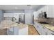 Well-equipped kitchen with stainless steel appliances and granite countertops, perfect for cooking at 10281 Wolves Den Ln, Las Vegas, NV 89178