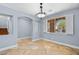 Bright living space featuring tiled floors, natural light, and architectural details at 10281 Wolves Den Ln, Las Vegas, NV 89178