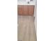 The bathroom has a wood cabinet, a white sink, and neutral walls at 10282 Keystone Pastures St, Las Vegas, NV 89183