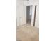 A bright bedroom featuring fresh carpet, neutral paint, and closet at 10282 Keystone Pastures St, Las Vegas, NV 89183