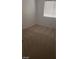 Bedroom with carpeted floors, a window, and white walls and base board trims at 10282 Keystone Pastures St, Las Vegas, NV 89183