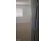 Bedroom with carpeted floors, a window, and white walls and base board trims at 10282 Keystone Pastures St, Las Vegas, NV 89183