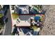 Aerial view of the property highlighting the roof, pool, putting green, and surrounding landscape at 10309 Canyon Valley Ave, Las Vegas, NV 89145