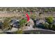 Aerial view of a home featuring a well-maintained lawn and desert landscape at 10309 Canyon Valley Ave, Las Vegas, NV 89145