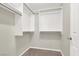 Walk-in closet with ample hanging space and neutral carpeting at 10309 Canyon Valley Ave, Las Vegas, NV 89145