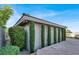 Beautiful backyard featuring decorative shrubs and stone pavers and plenty of space for recreation at 10309 Canyon Valley Ave, Las Vegas, NV 89145