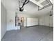Spacious garage with epoxy flooring and custom storage cabinets at 10309 Canyon Valley Ave, Las Vegas, NV 89145