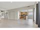 Open-concept living area with tile flooring leading to a well-appointed kitchen at 10309 Canyon Valley Ave, Las Vegas, NV 89145