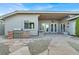 Backyard with a built-in grill, patio area, and desert landscaping at 10309 Canyon Valley Ave, Las Vegas, NV 89145