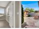 Covered patio with stone hardscape and grill at 10309 Canyon Valley Ave, Las Vegas, NV 89145