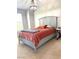 Bedroom with stylish chandelier, plush carpet, and modern color scheme at 10550 W Alexander Rd # 2179, Las Vegas, NV 89129