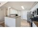 The kitchen has stainless steel appliances, lots of counter space, and an eat-in bar at 10550 W Alexander Rd # 2179, Las Vegas, NV 89129
