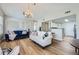 A spacious living room with an open layout and direct access to the kitchen area at 10550 W Alexander Rd # 2179, Las Vegas, NV 89129