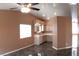 Open kitchen area featuring ample counter space, tile floors, and modern lighting at 128 Golf Course St, Las Vegas, NV 89145