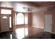 Bright living room with hardwood floors and large windows providing natural light at 128 Golf Course St, Las Vegas, NV 89145