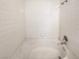 Clean, all-white bathtub with shower, perfect for relaxation and easy maintenance at 1405 S Nellis Blvd # 2087, Las Vegas, NV 89104