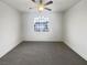 Clean bedroom with neutral carpet, a window, and ample space for personalized decor at 1405 S Nellis Blvd # 2087, Las Vegas, NV 89104