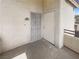 Apartment entrance featuring a secure gate and a view of the surrounding building architecture at 1405 S Nellis Blvd # 2087, Las Vegas, NV 89104