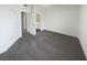 Spacious main bedroom featuring neutral carpet and access to ensuite bathroom, ready for your personal touch at 1405 S Nellis Blvd # 2087, Las Vegas, NV 89104