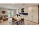 Eat-in kitchen with a wine fridge and backyard access at 1712 Chapman Dr, Las Vegas, NV 89104