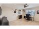 Well-lit home office featuring modern décor, ample desk space, and comfortable seating at 1712 Chapman Dr, Las Vegas, NV 89104