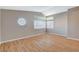 Bright bedroom featuring laminate floors, high ceilings, and lots of natural light at 1800 Summit Pointe Dr, Las Vegas, NV 89117