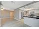 View of the kitchen area showing stainless steel refrigerator and easy access to living spaces at 1800 Summit Pointe Dr, Las Vegas, NV 89117