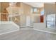 Open living area featuring a staircase and a front door entrance at 1800 Summit Pointe Dr, Las Vegas, NV 89117