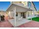 Covered patio seating area provides a relaxing outdoor space and entertainment at 1800 Summit Pointe Dr, Las Vegas, NV 89117