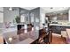Spacious dining room next to the kitchen with dark wood dining table at 1861 Windward Ct, Henderson, NV 89012