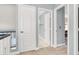 Well-lit hallway with multiple doorways offering access to different parts of the home at 1861 Windward Ct, Henderson, NV 89012