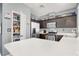 Well-lit kitchen featuring stainless steel appliances, plentiful counter space, and a walk-in pantry at 1861 Windward Ct, Henderson, NV 89012