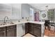 Bright kitchen featuring stainless steel appliances, laminate countertops, and a window above the sink at 1861 Windward Ct, Henderson, NV 89012