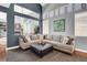 Inviting living room featuring a large sectional, oversized ottoman and an open floorplan at 1861 Windward Ct, Henderson, NV 89012