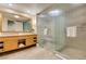 Large bathroom featuring double sinks and a spacious glass shower with a built in bench at 2000 Fashion Show Dr # 5509, Las Vegas, NV 89109